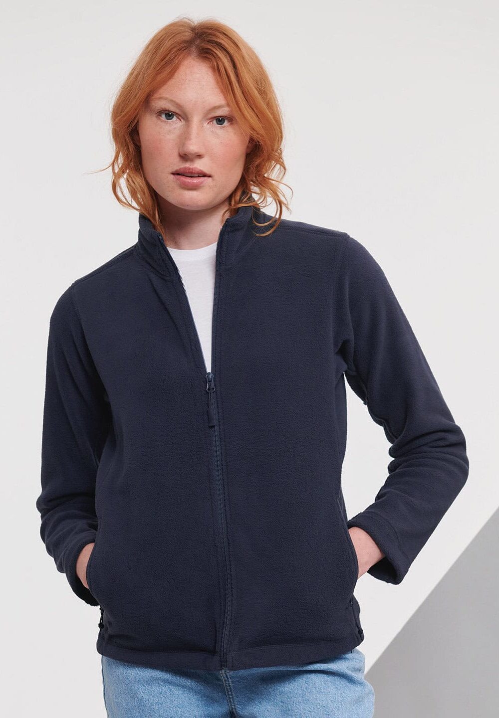 Softshell jacket for embroidered workwear and personalised uniforms, navy blue colour, front zip, long sleeves, casual style, suitable for corporate or team branding.