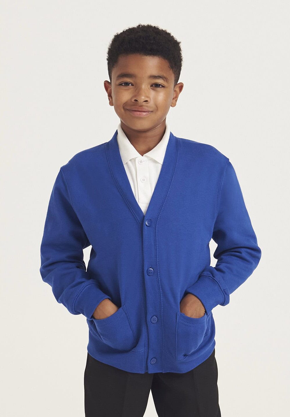 Bright blue school cardigan worn by a young boy, embroidered workwear and personalised uniform for children, soft knit fabric with button closure, ideal for school uniform needs.