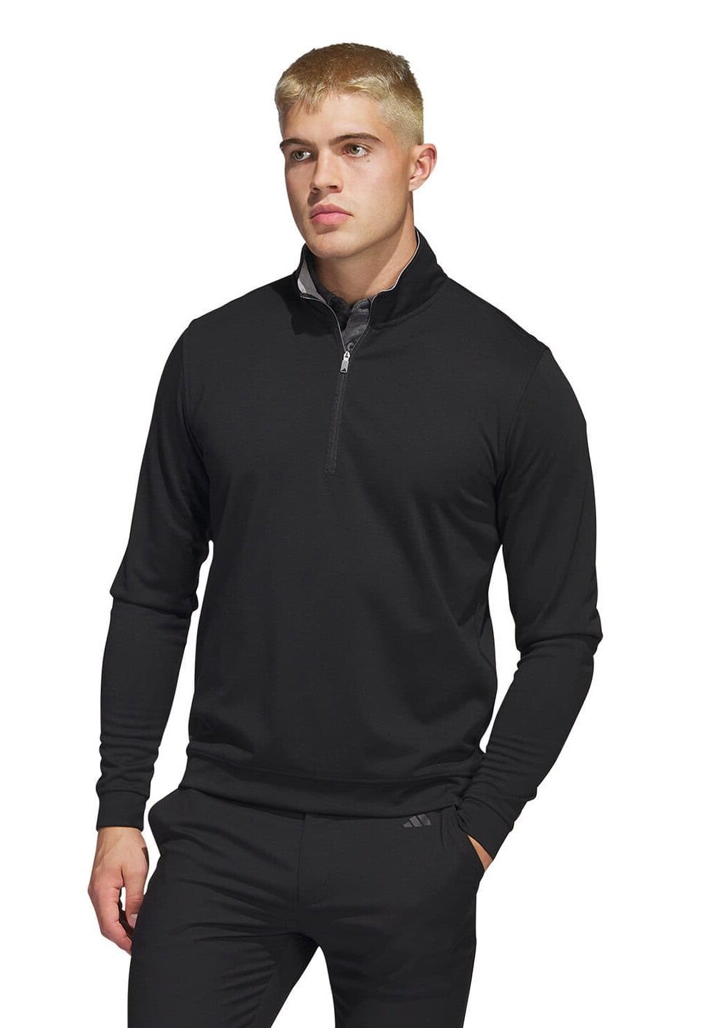 Men's black embroidered workwear with a half-zip collar, suitable for personalised uniforms and professional embroidery. Perfect for uniformed teams in various industries.