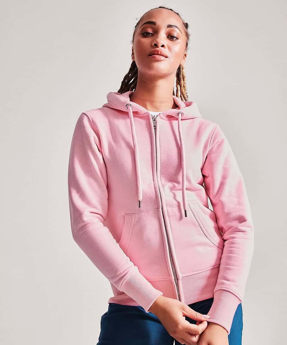 Woman wearing a pink full-zip hoodie, ideal for custom embroidery or printing.