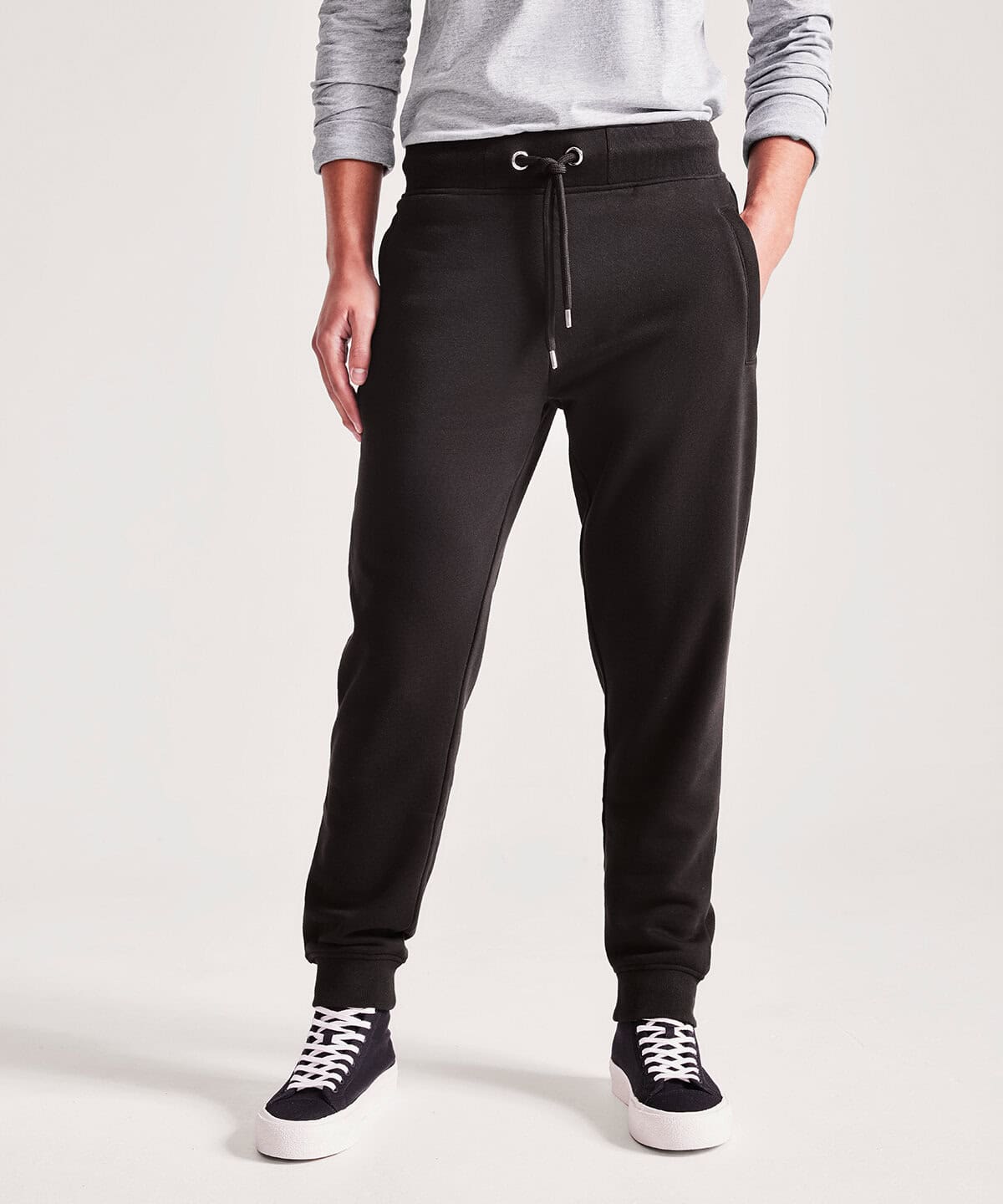Comfortable black joggers with elastic waistband and drawstring, perfect for workwear or casual uniforms. Ideal for personalised embroidery and embroidered workwear options.
