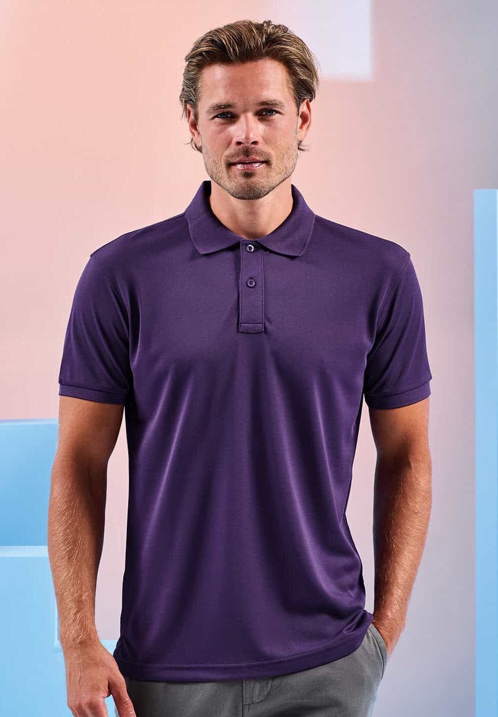 Comfortable purple polo shirt made from performance fabric, suitable for embroidery workwear and personalised uniforms. Perfect for professional or promotional use.
