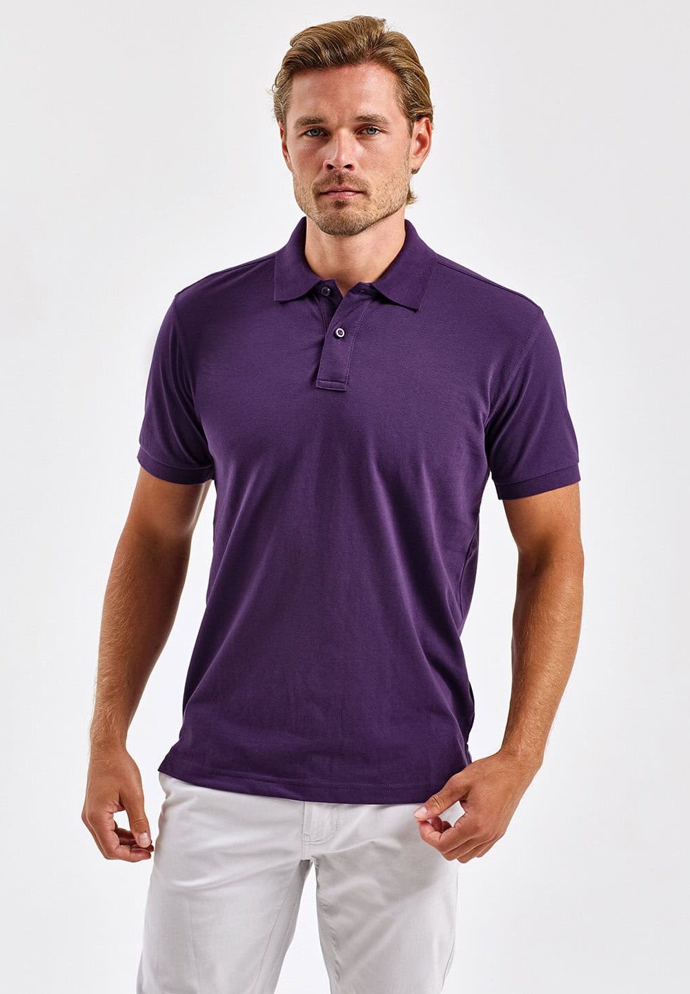 Men's purple polo shirt for embroidered workwear and personalised uniforms, showcasing professional and custom embroidered clothing options.