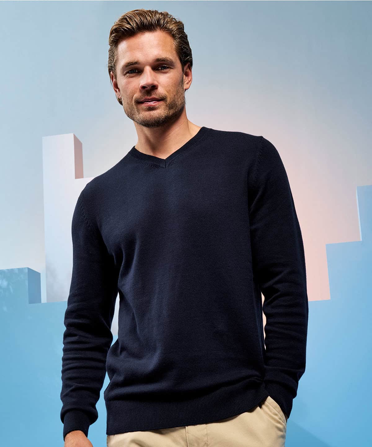 Men's navy V-neck jumper, ideal for corporate workwear, personalised uniforms, and embroidered clothing. Comfortable, durable, perfect for team branding and professional embroidery.