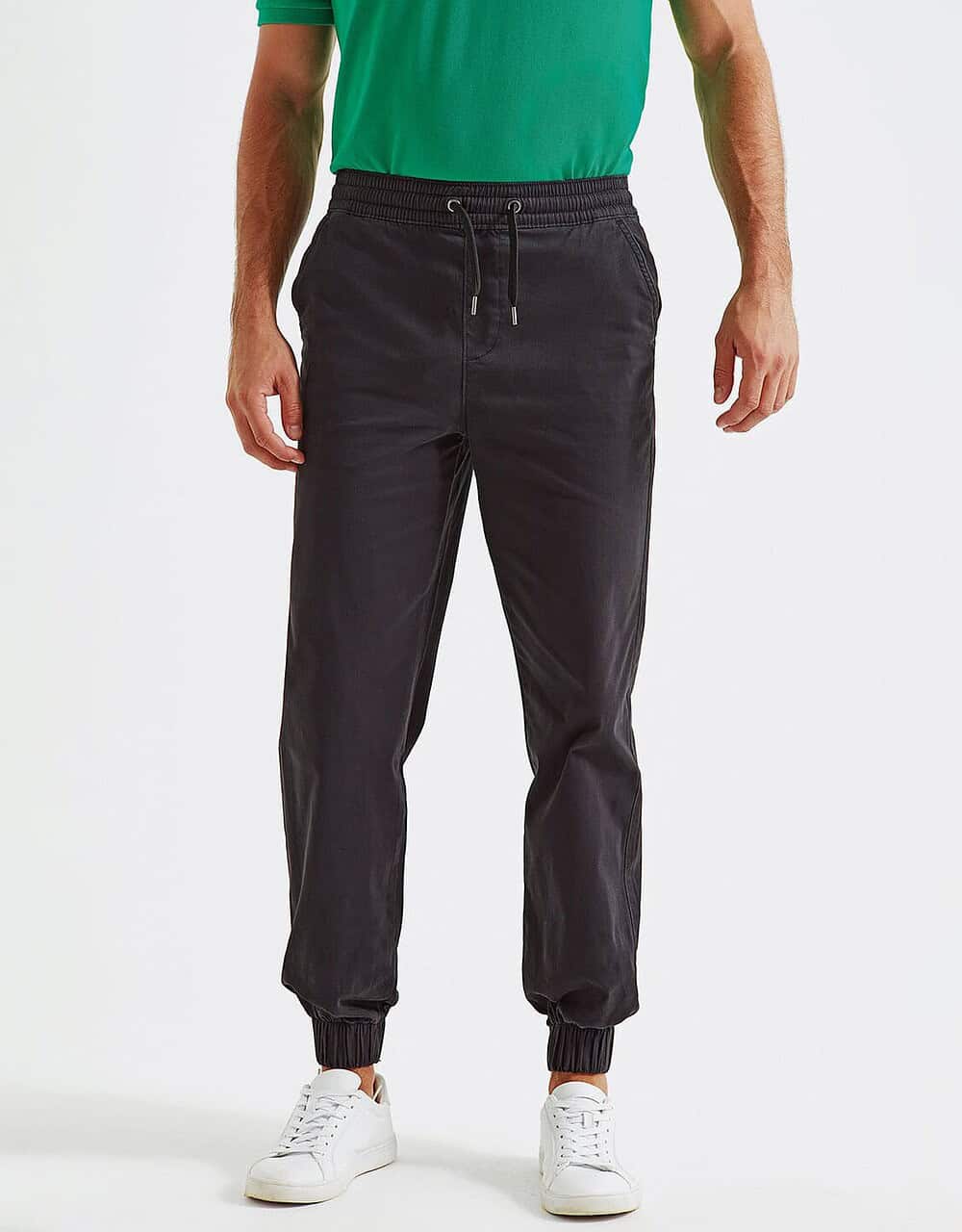 Black workwear joggers with elasticised cuffs and drawstring waist, ideal for personalised embroidered workwear, suitable for various industries.
