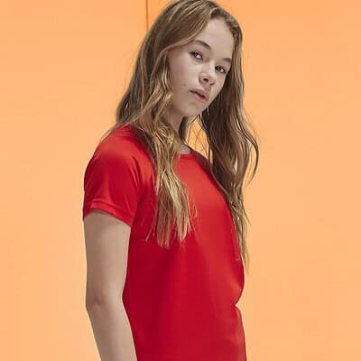 Bright red B&C Active T/Kids worn by a young girl on a peach background.