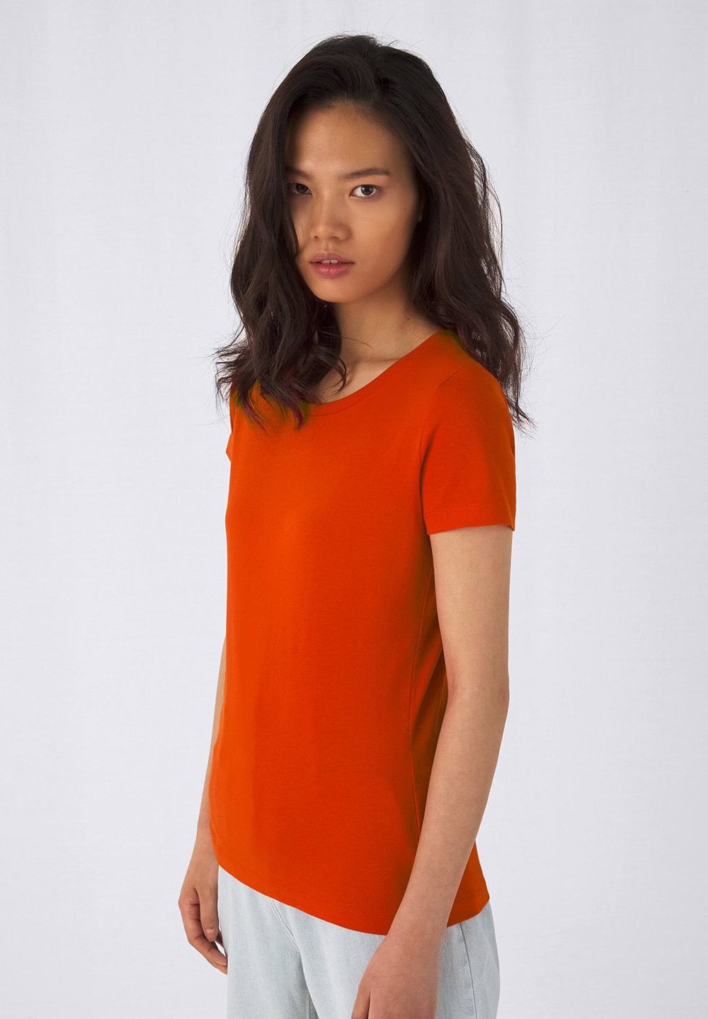 Vibrant orange women's T-shirt, perfect for customised embroidery workwear and personalised uniforms, made from comfortable, high-quality fabric.