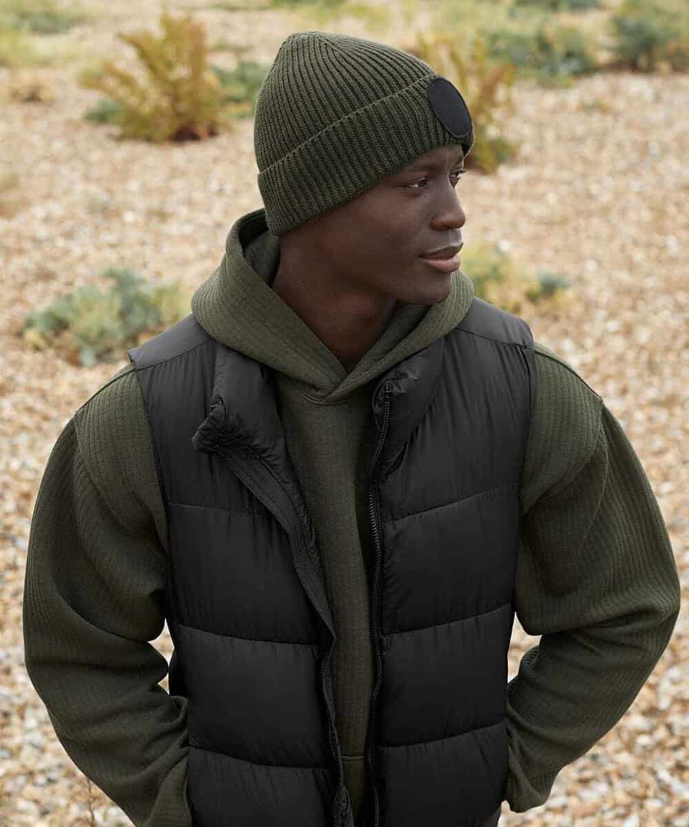 Green Beechfield B332R patch beanie with circular logo, ideal for custom embroidery.