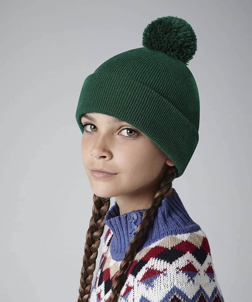 Green junior pom pom beanie with a large fluffy pom-pom on top. Perfect for personalised embroidery.