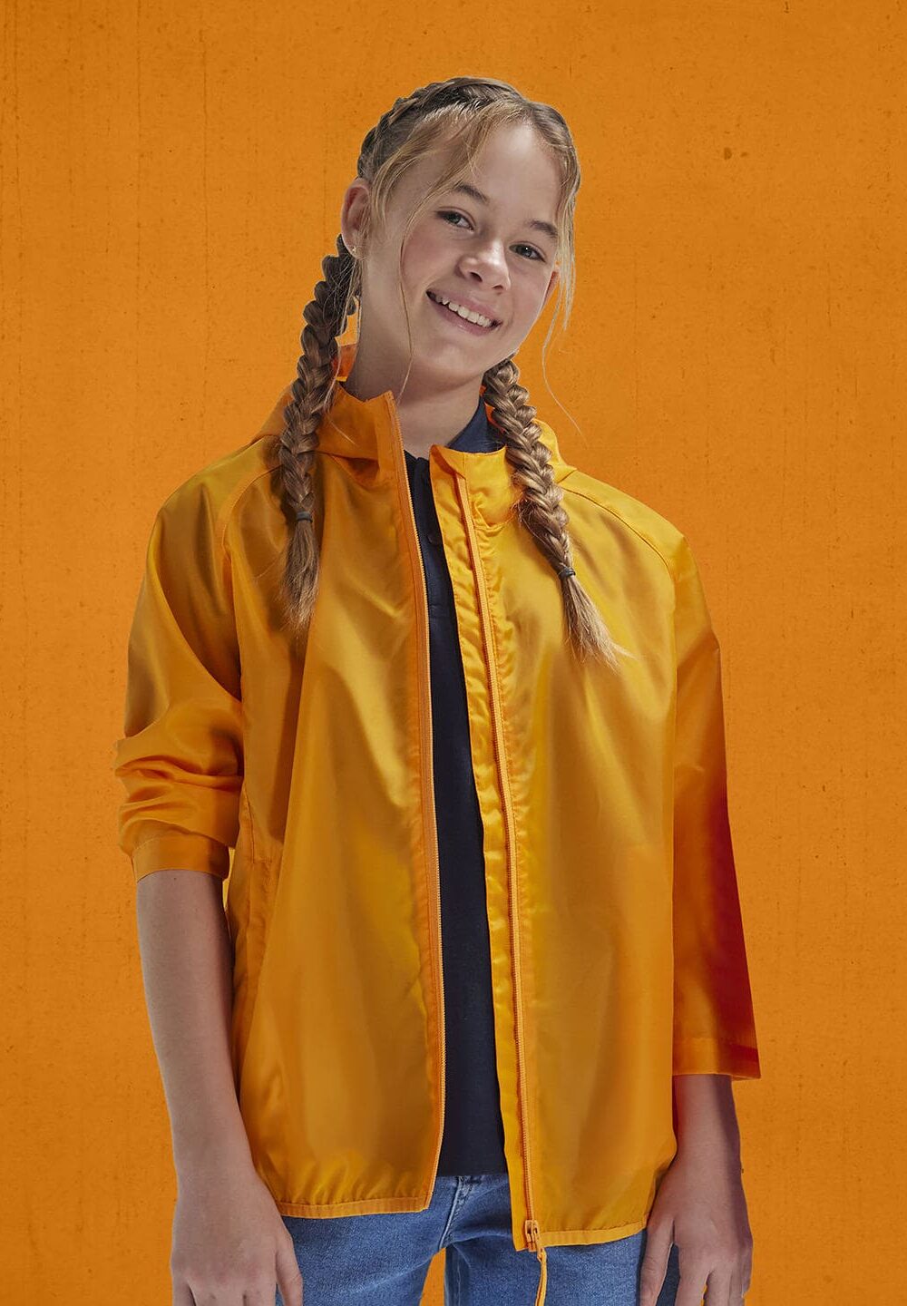 Bright yellow waterproof workwear jacket with embroidered logo for personalised staff uniforms. Suitable for construction, hospitality, or service industry workers. Custom embroidery options available.