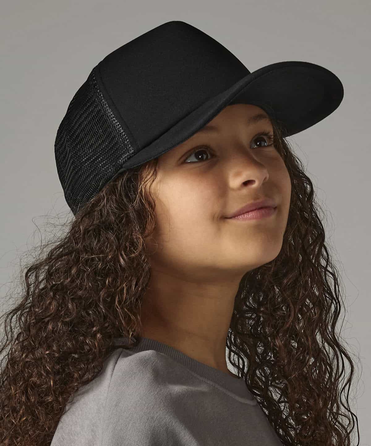 Plain black embroidered workwear cap with mesh back for personalised uniforms.