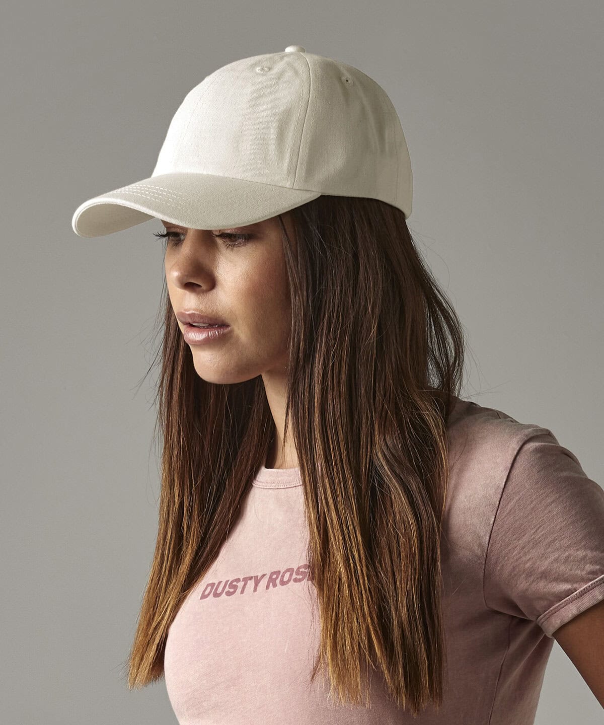 White embroidered baseball cap for workwear and personalised uniforms, casual and stylish embroidered headwear for branding and corporate identity.
