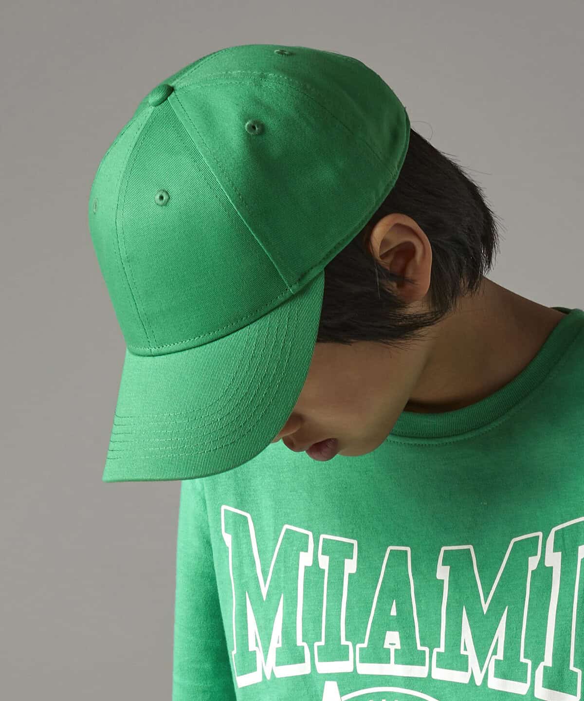 Bright green baseball cap with embroidered logo, casual promotional workwear accessory.