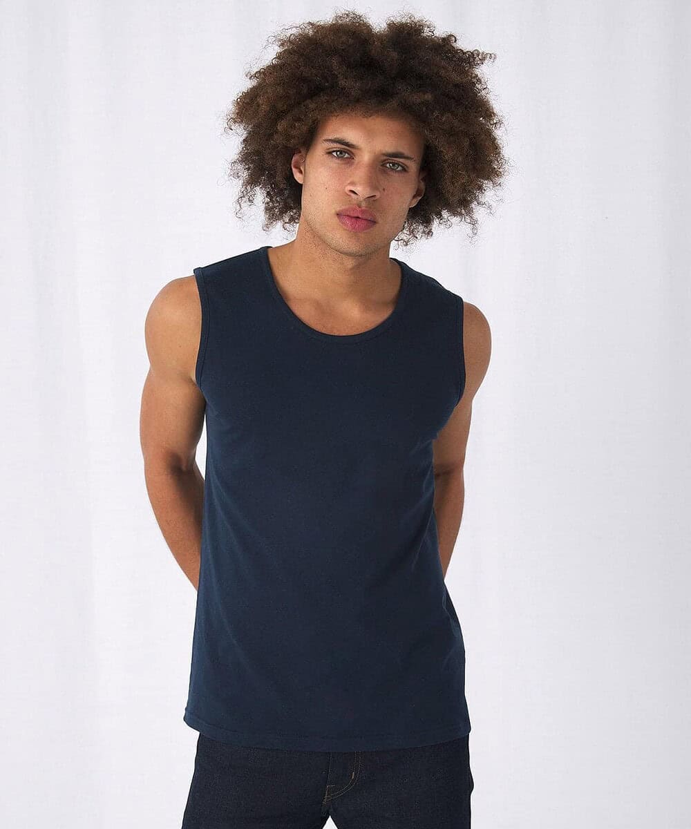Embroidered navy sleeveless vest from BC Collection, ideal for custom workwear and promotional cloth.