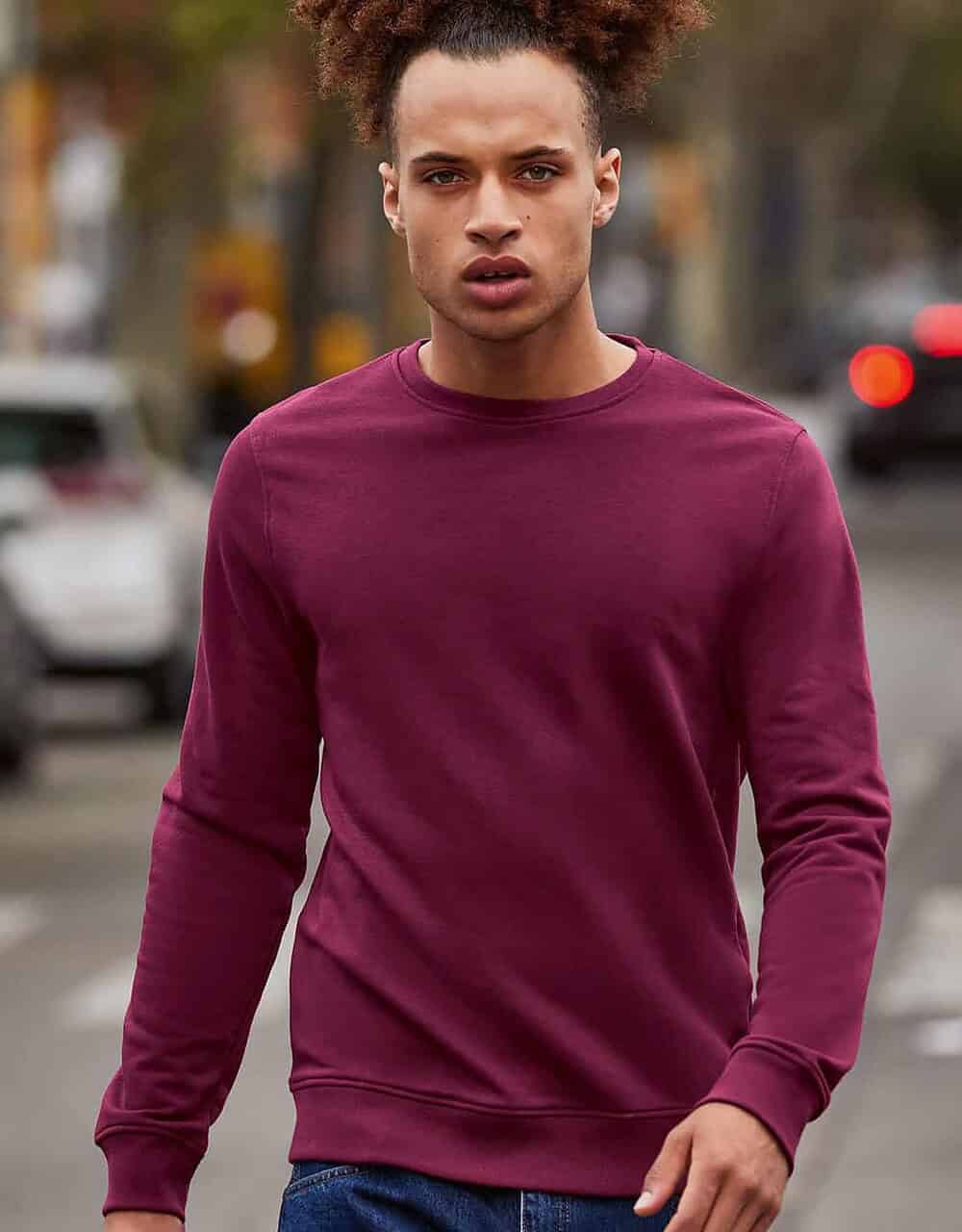 Bright red embroidered workwear sweatshirt for personalised uniforms and corporate apparel.