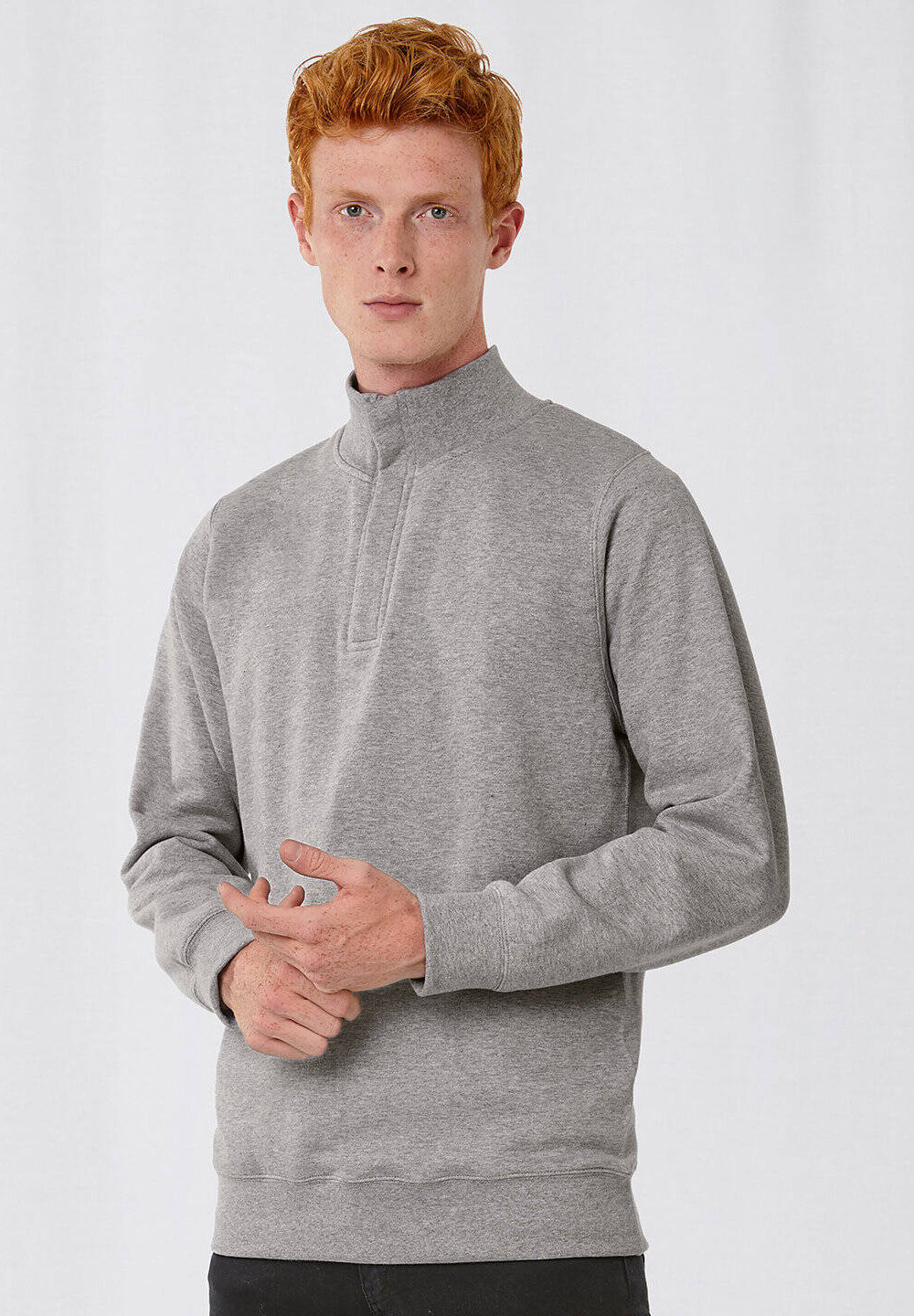 Warm grey embroidered workwear sweatshirt with a half zip, perfect for personalised uniforms and professional workwear. Designed for durability and comfort with logo embroidery options.