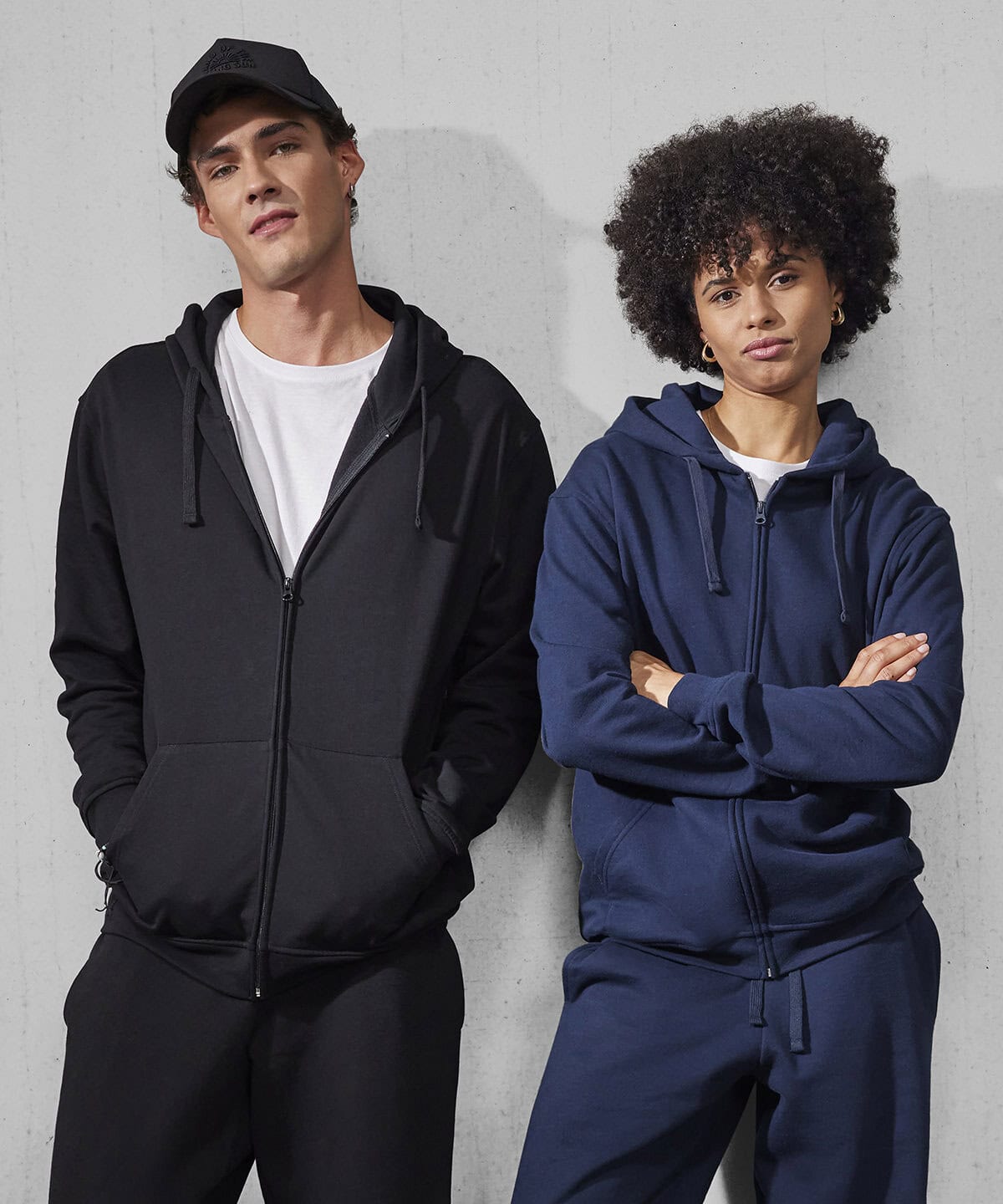 Black embroidered workwear hoodie and navy personalised uniform zip hoodie, featuring casual comfortable styles for corporate or corporate casual apparel. Perfect for custom embroidery on work or casual wear.