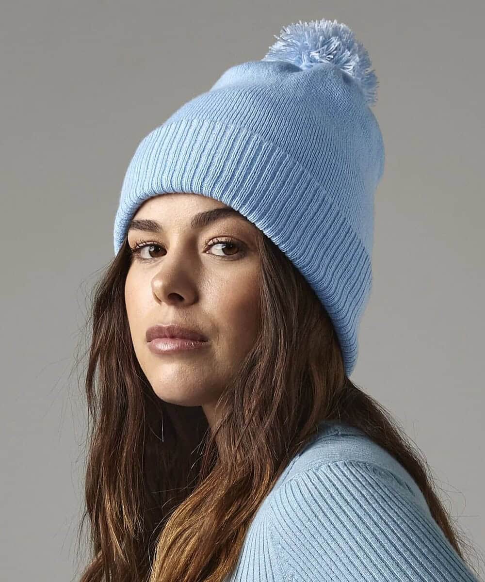 Light blue Snowstar beanie with pom-pom, perfect for workwear or casual wear.