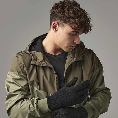 Man wearing Beechfield BC495 Thinsulate gloves, close-up view.