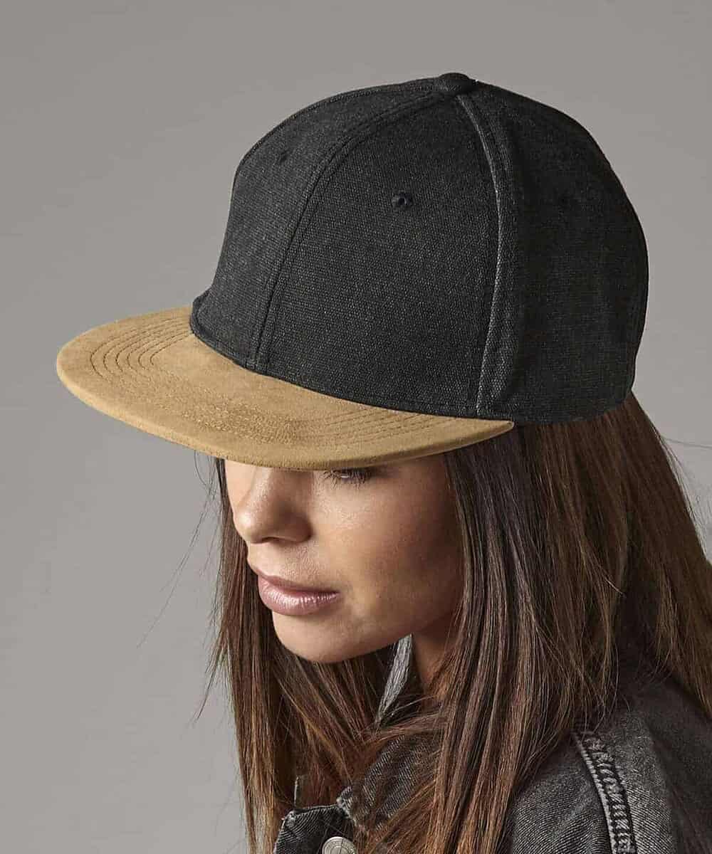 Black and tan Beechfield BC668 suede peak snapback cap for custom embroidery.