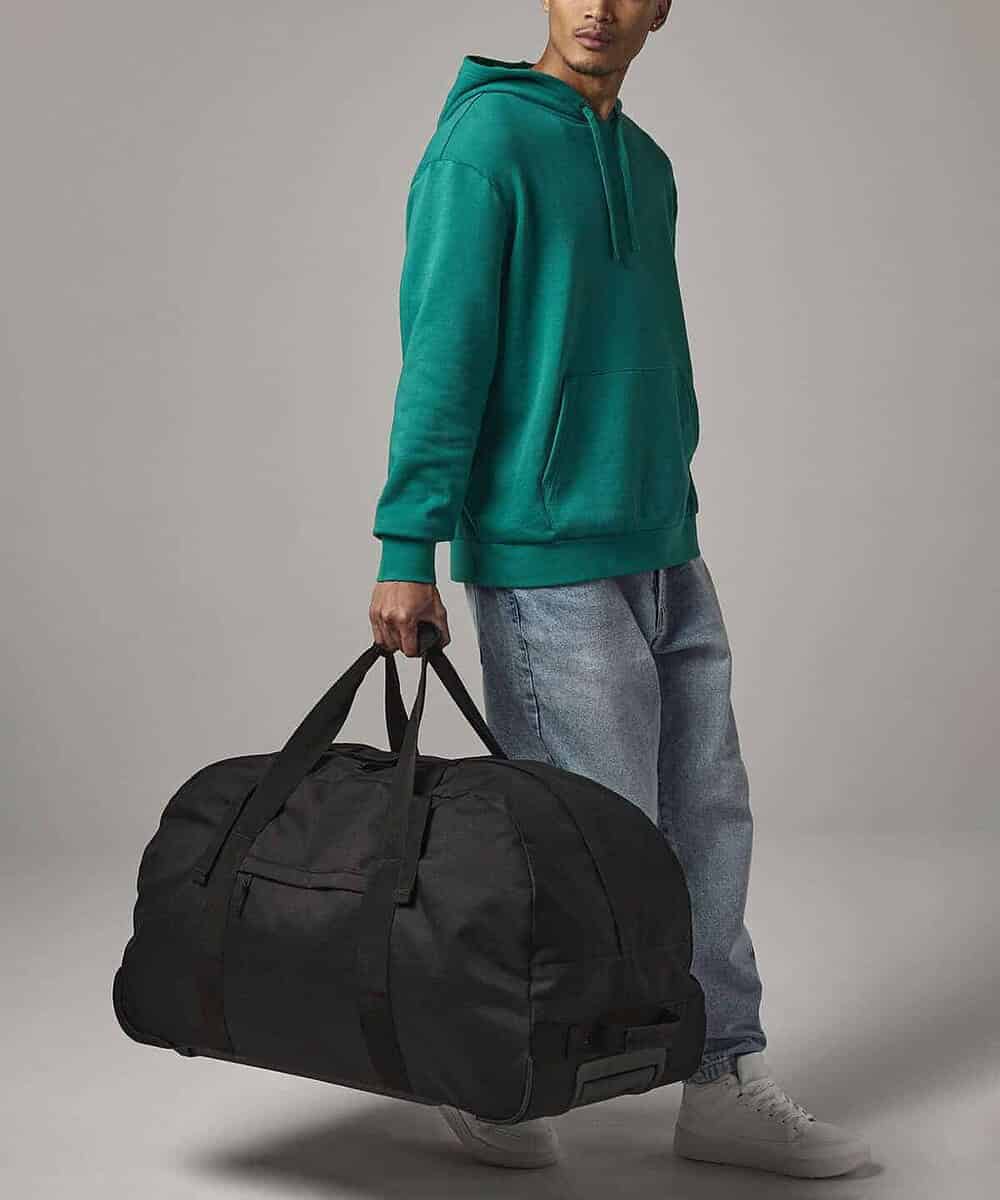 Wheelie holdall for embroidery and printing, ideal for travel and sports. Durable black design with.