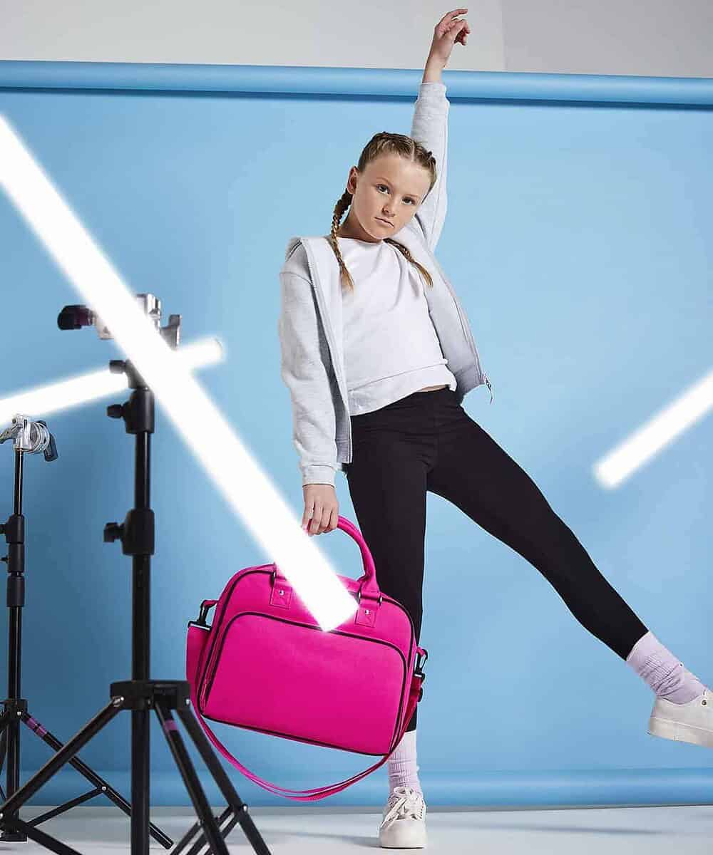 Embroidery-ready Junior Dance Bag in vibrant pink, perfect for custom branding and promotional use.