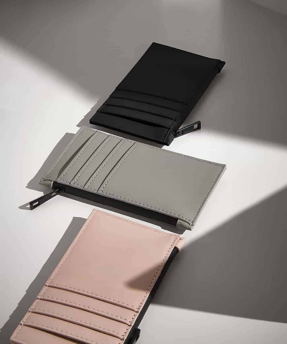 Black, grey, and pink PU card holders with multiple card slots for personalised embroidery.