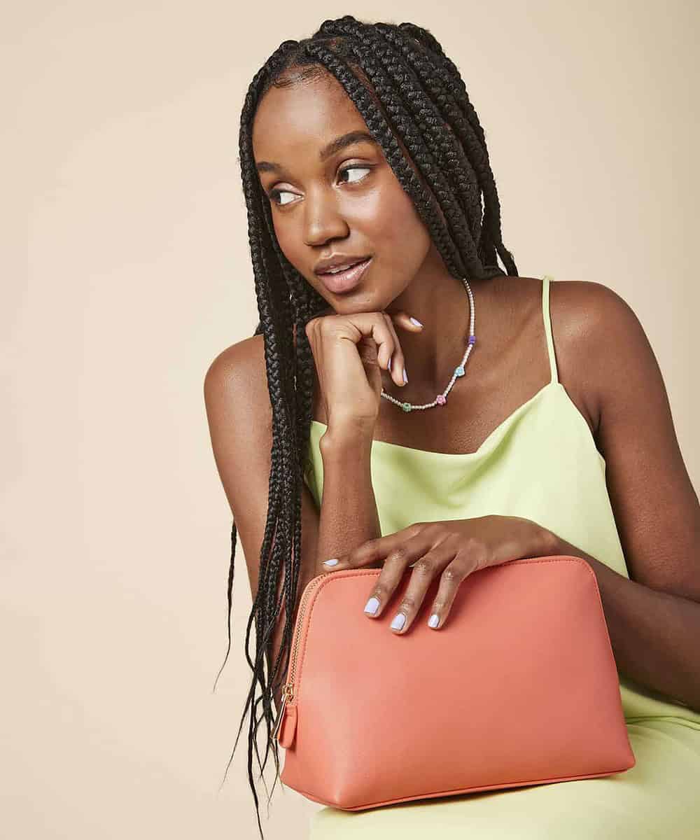 Elegant coral accessory case ideal for personalised embroidery projects.