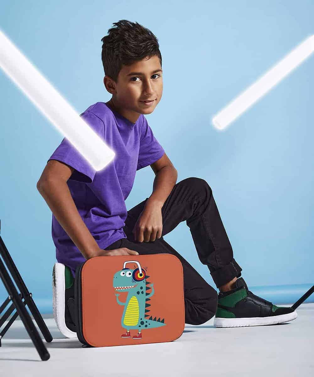 Bright orange lunch cooler bag with a colourful dinosaur design, perfect for custom embroidery.