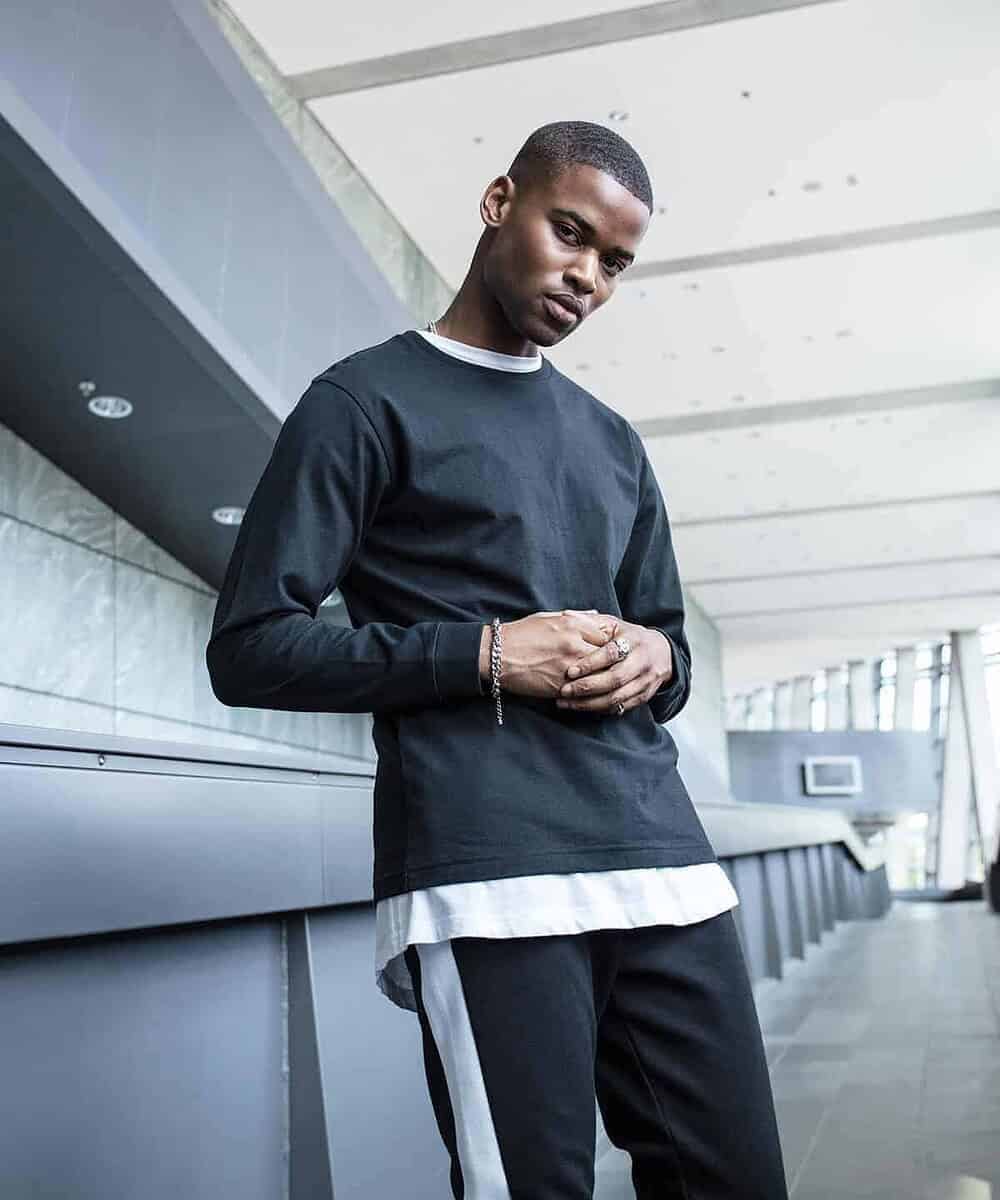 Embroidered workwear featuring the BY091 long sleeve with cuff rib, ideal for custom branding and pr.