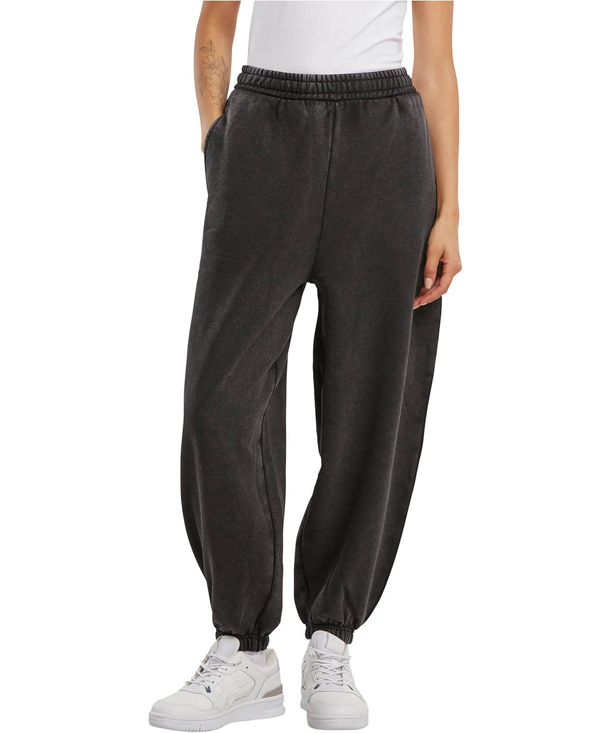 Casual black joggers with elastic waistband and ankle cuffs, suitable for custom embroidery.