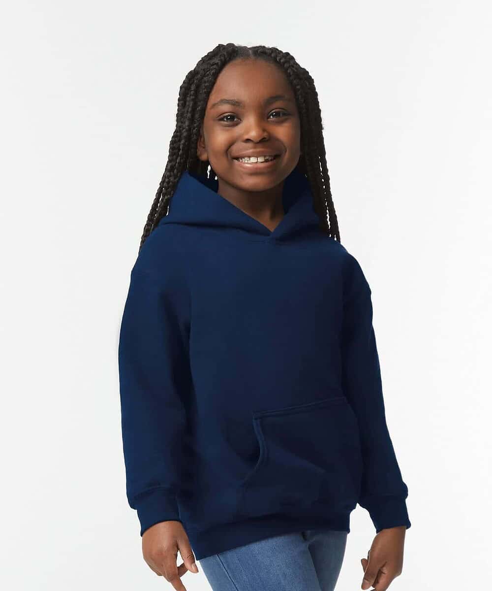 Child wearing a navy blue Gildan heavy blend hoodie, front view.