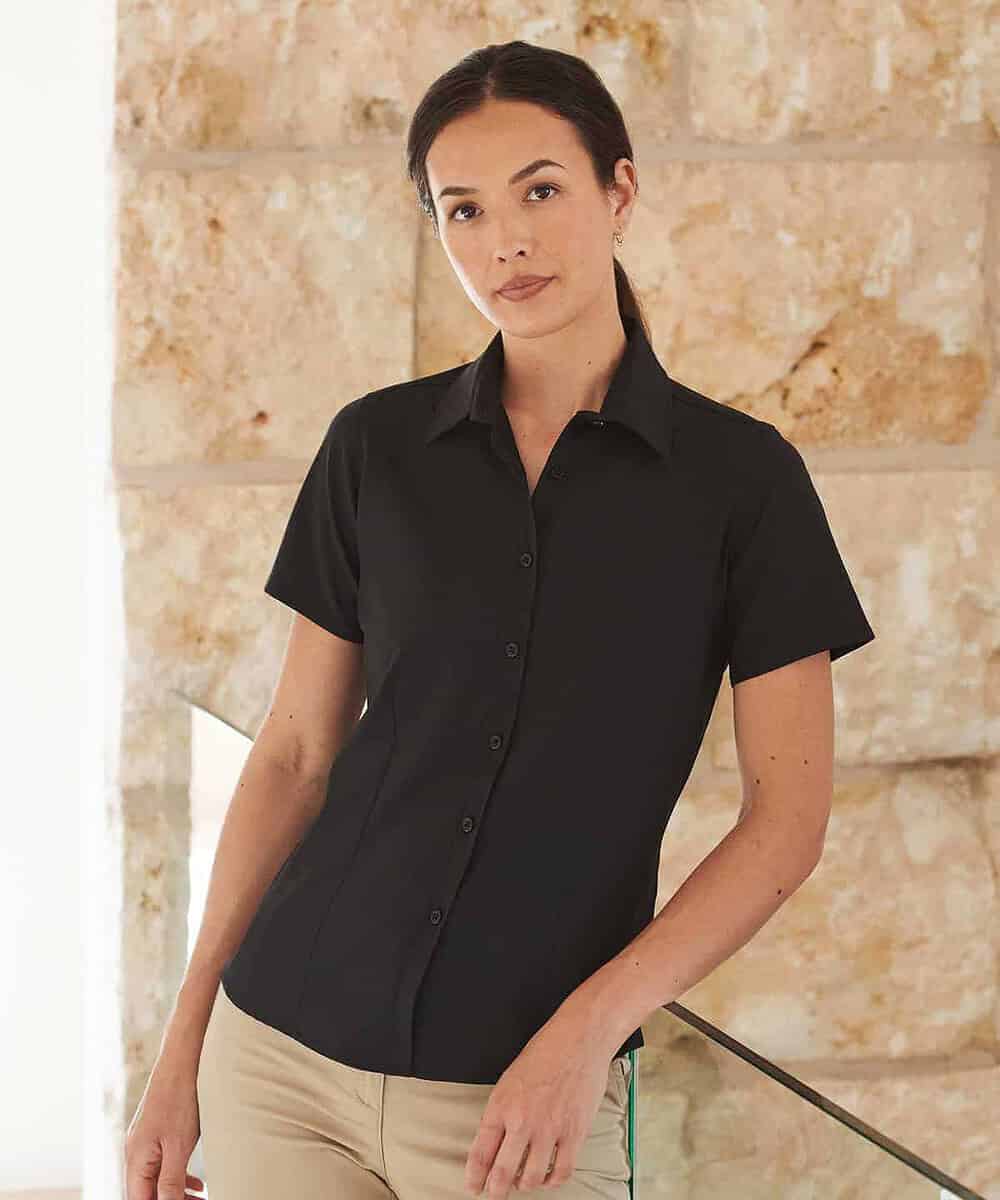 Black women's short sleeve work shirt with antibacterial and moisture-wicking features.