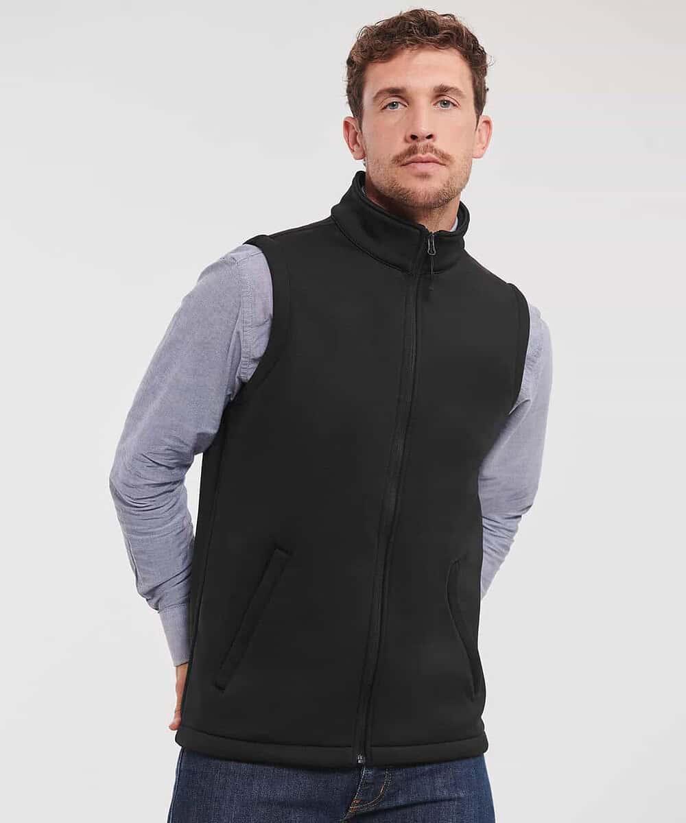 High-quality black softshell gilet ideal for workwear and uniforms. Comfortable, durable, and perfec.