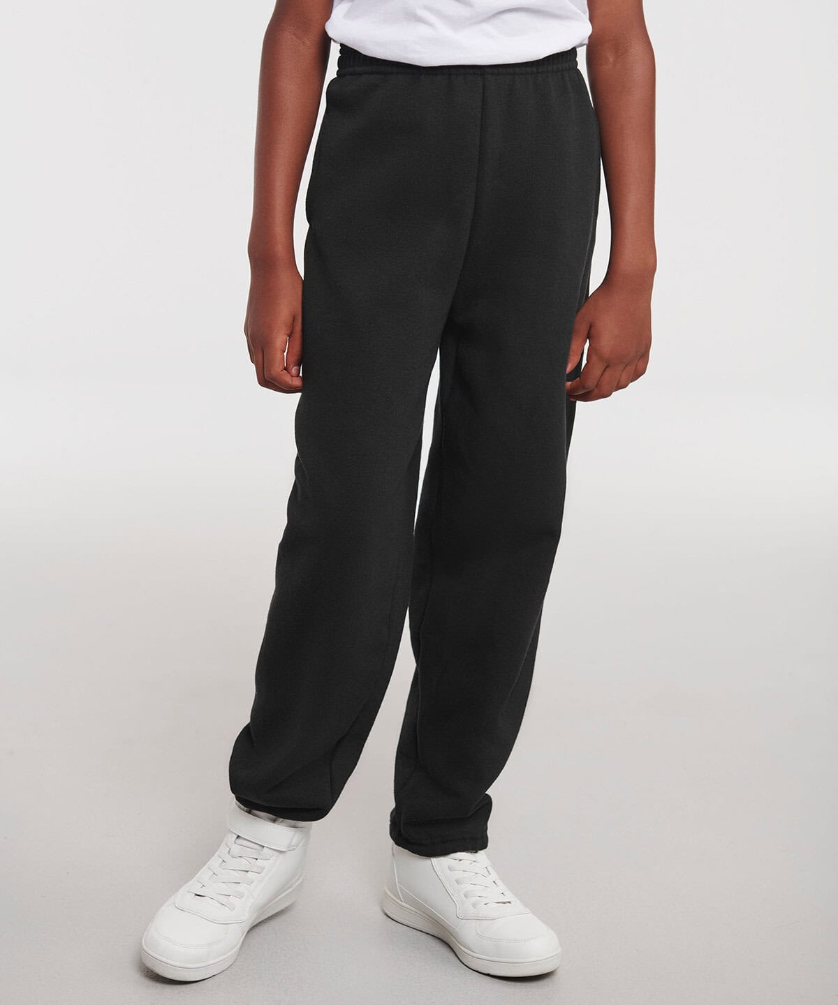 Comfy black jogger trousers, perfect for workwear and casual uniforms, paired with white sneakers, ideal for embroidered workwear and personalised uniforms.