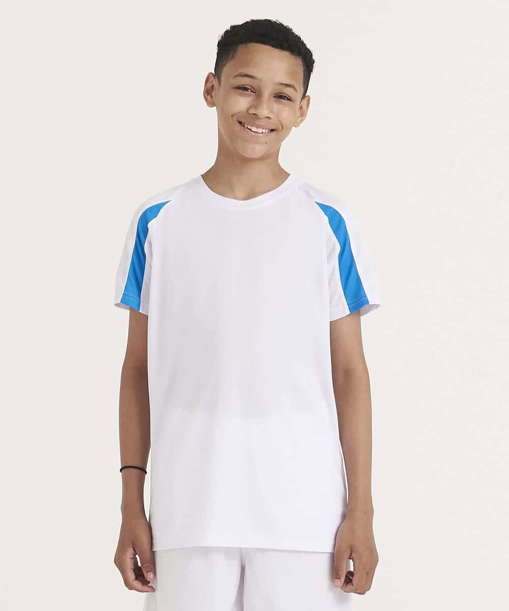 Child wearing a white and blue contrast T-shirt, ideal for custom embroidery.