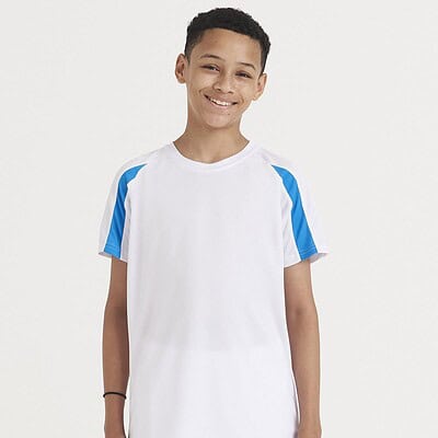 Child wearing a white and blue contrast T-shirt, ideal for custom embroidery.