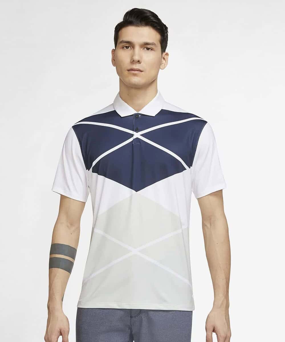 Man wearing Nike NK338 Vapor Argyle Print Polo shirt, front view.