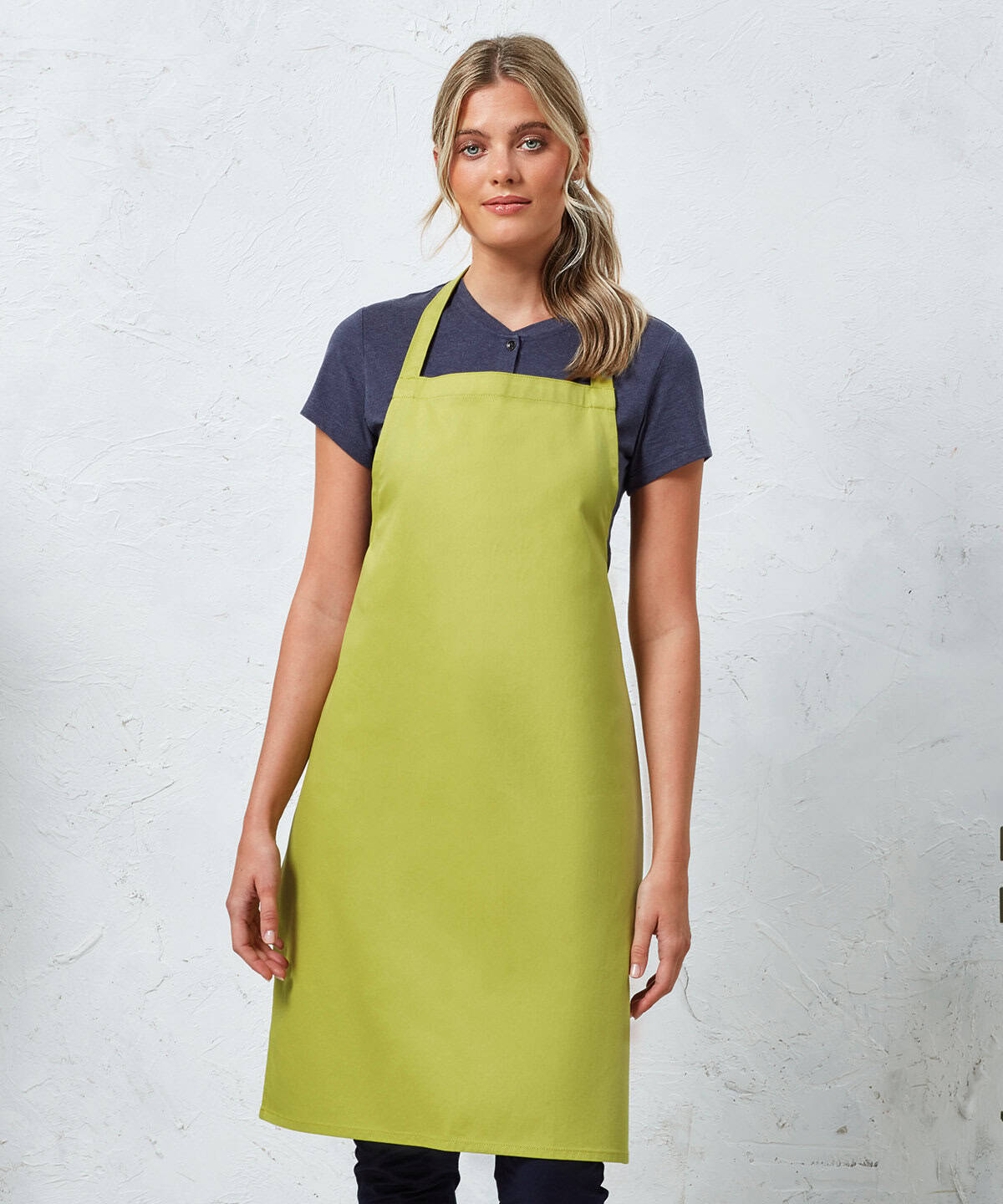 A vibrant lime green embroidered workwear apron for personalised uniforms and professional embroidery.