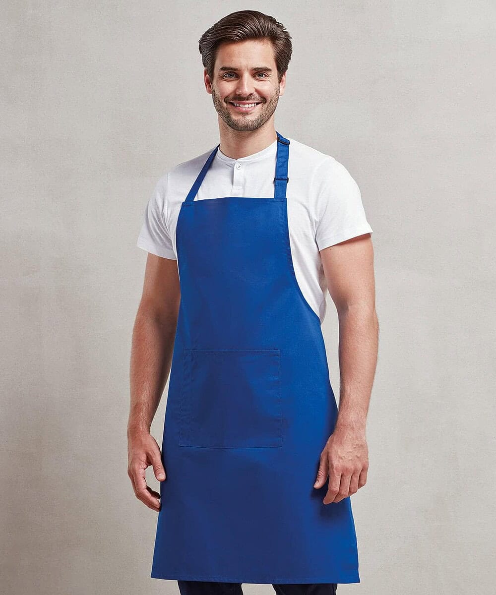 Bib apron with pocket in vibrant blue, ideal for personalised embroidery and workwear.
