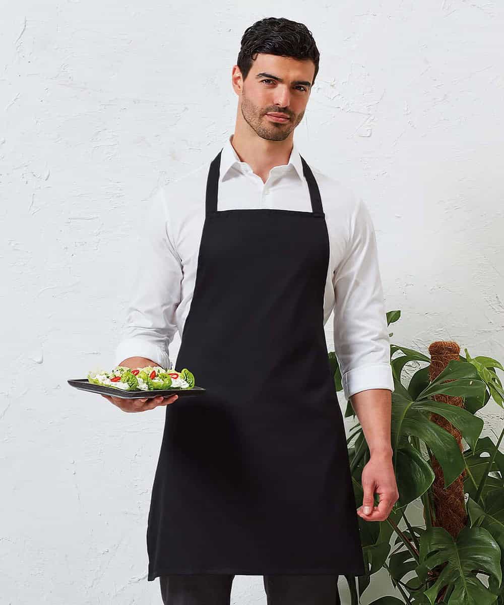 Embroidered workwear bib apron in black, ideal for personalised embroidery and printing.