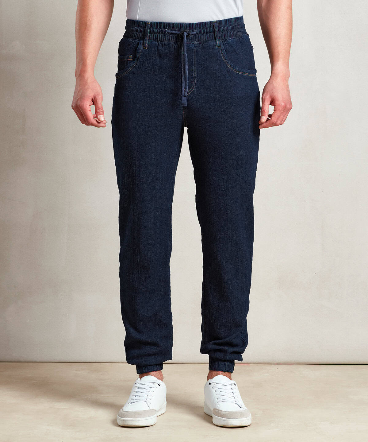 Casual men's navy joggers with elasticated cuffs and drawstring waistband.