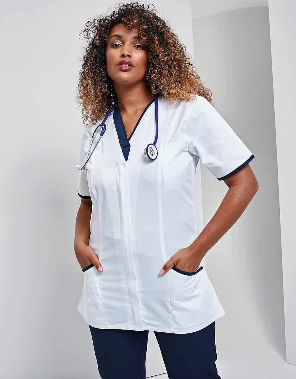 Comfortable white medical uniform with navy accents, perfect for healthcare professionals, featuring embroidered workwear and personalised uniforms.