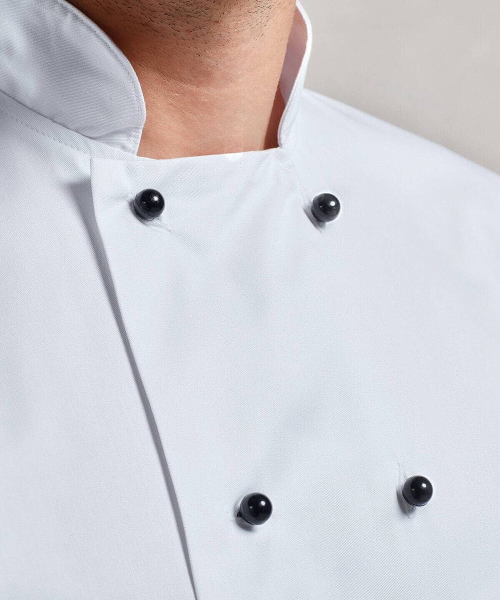 White chef jacket with black studs, ideal for personalised embroidery workwear.