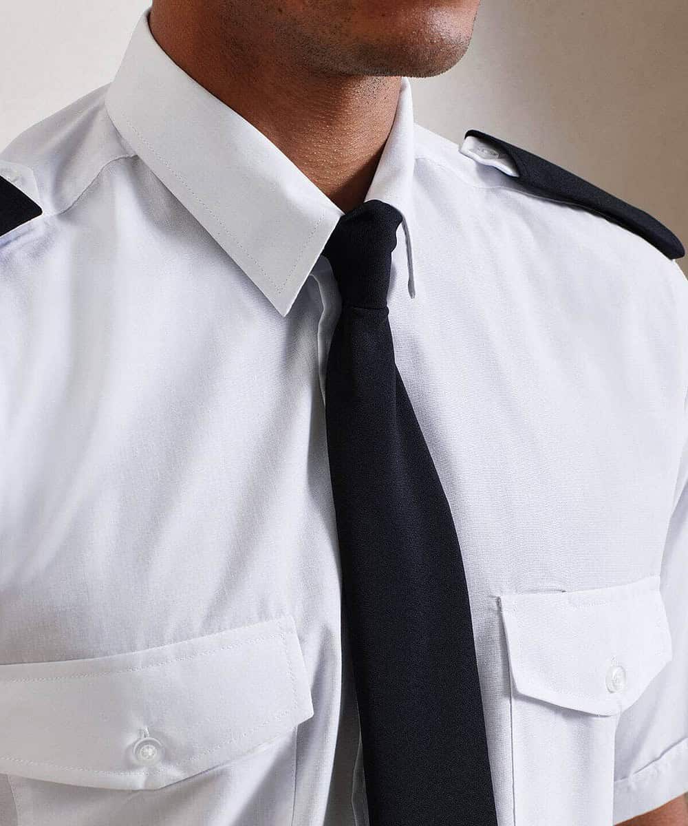 Embroidered police uniform with personalised clip tie for professional appearance.