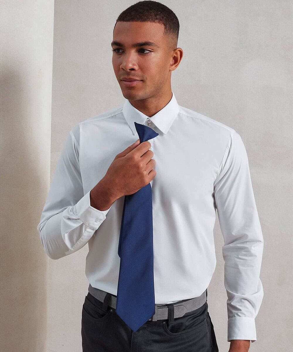 Embroidery-ready Premier PR785 tie in classic blue, perfect for custom branding and professional uni.