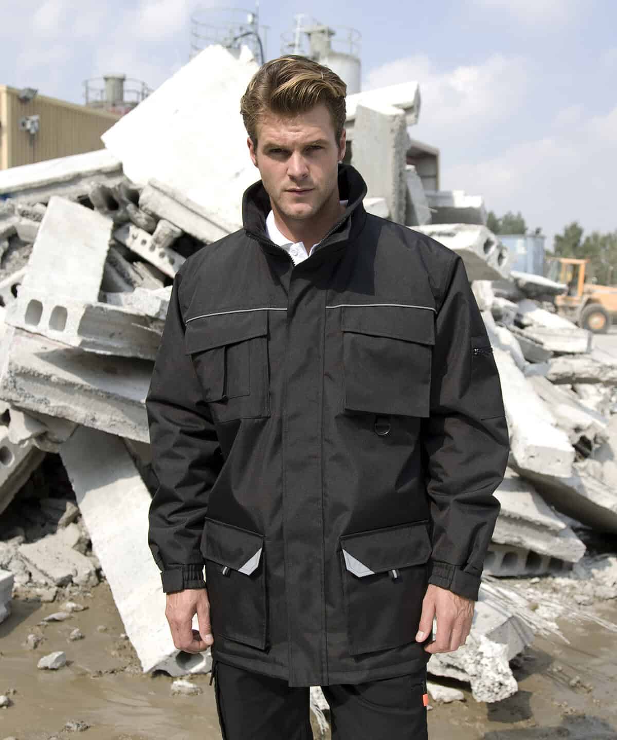 High visibility workwear with reflective strips for construction safety.