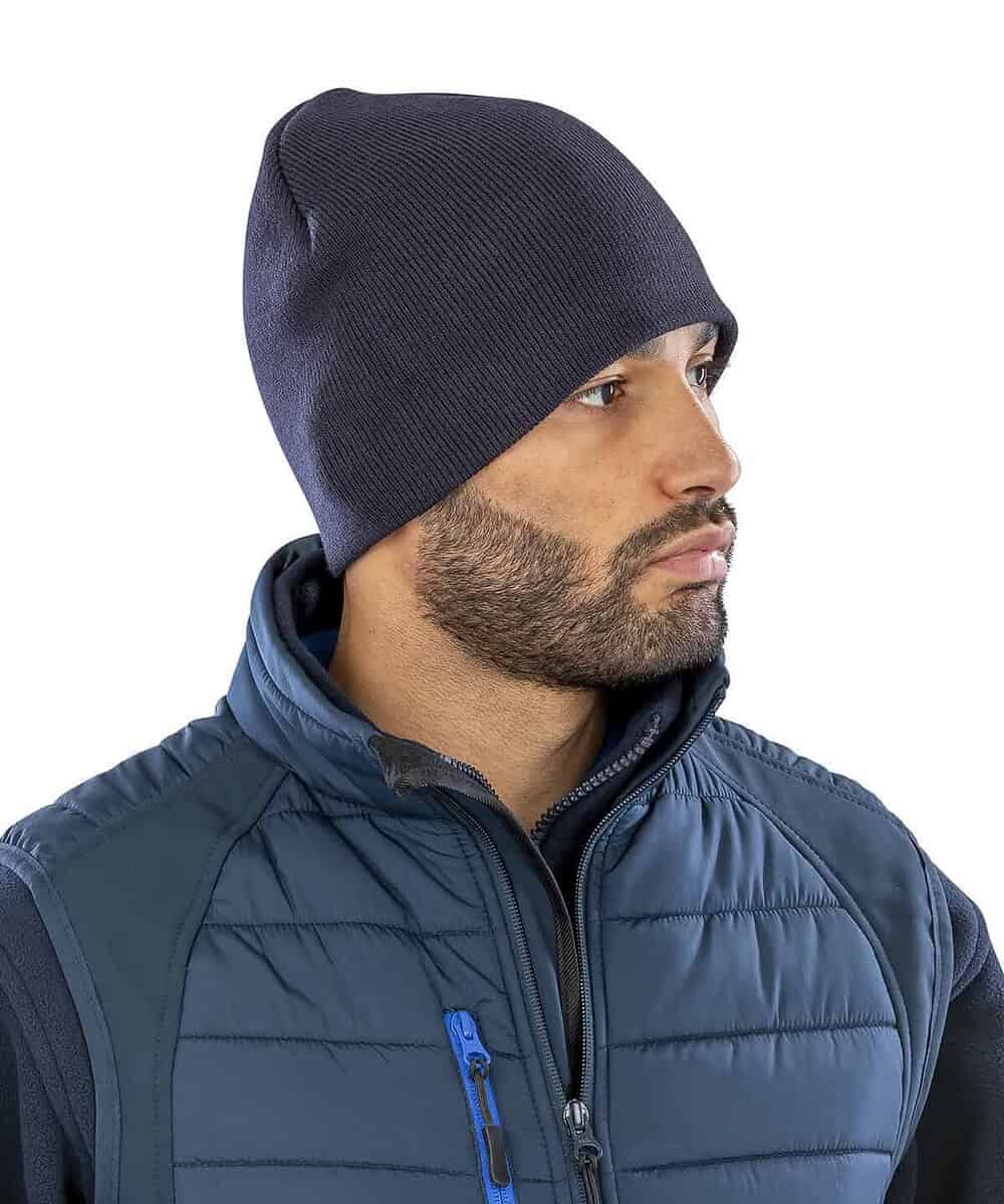 Acrylic beanie hat in navy, perfect for custom branding and winter warmth. Ideal for workwear and pr.