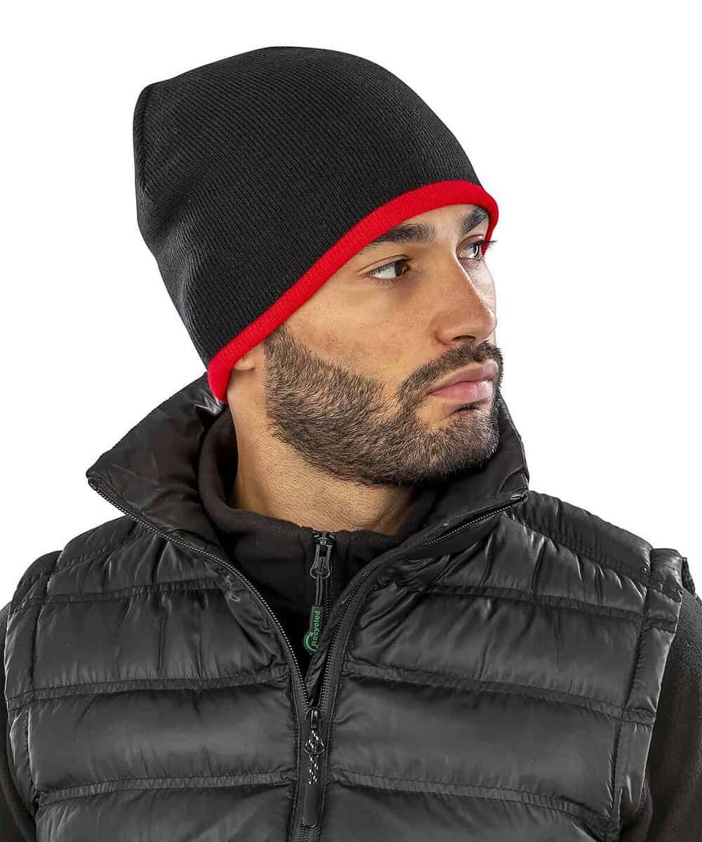 Reversible fashion fit hat in black with red trim, personalised with your logo for winter wear.