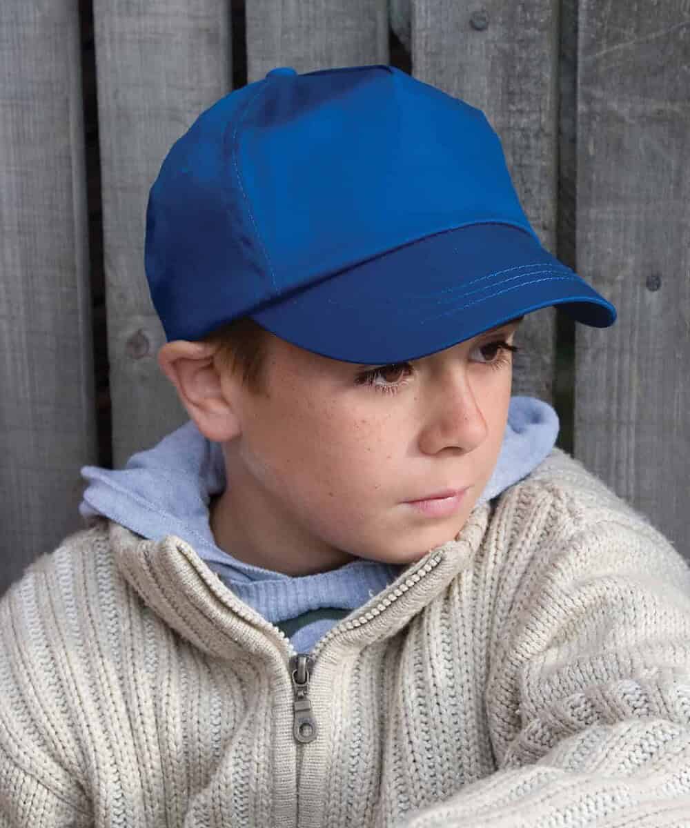 Blue junior cotton cap with adjustable strap, ideal for personalised branding and promotional headwe.